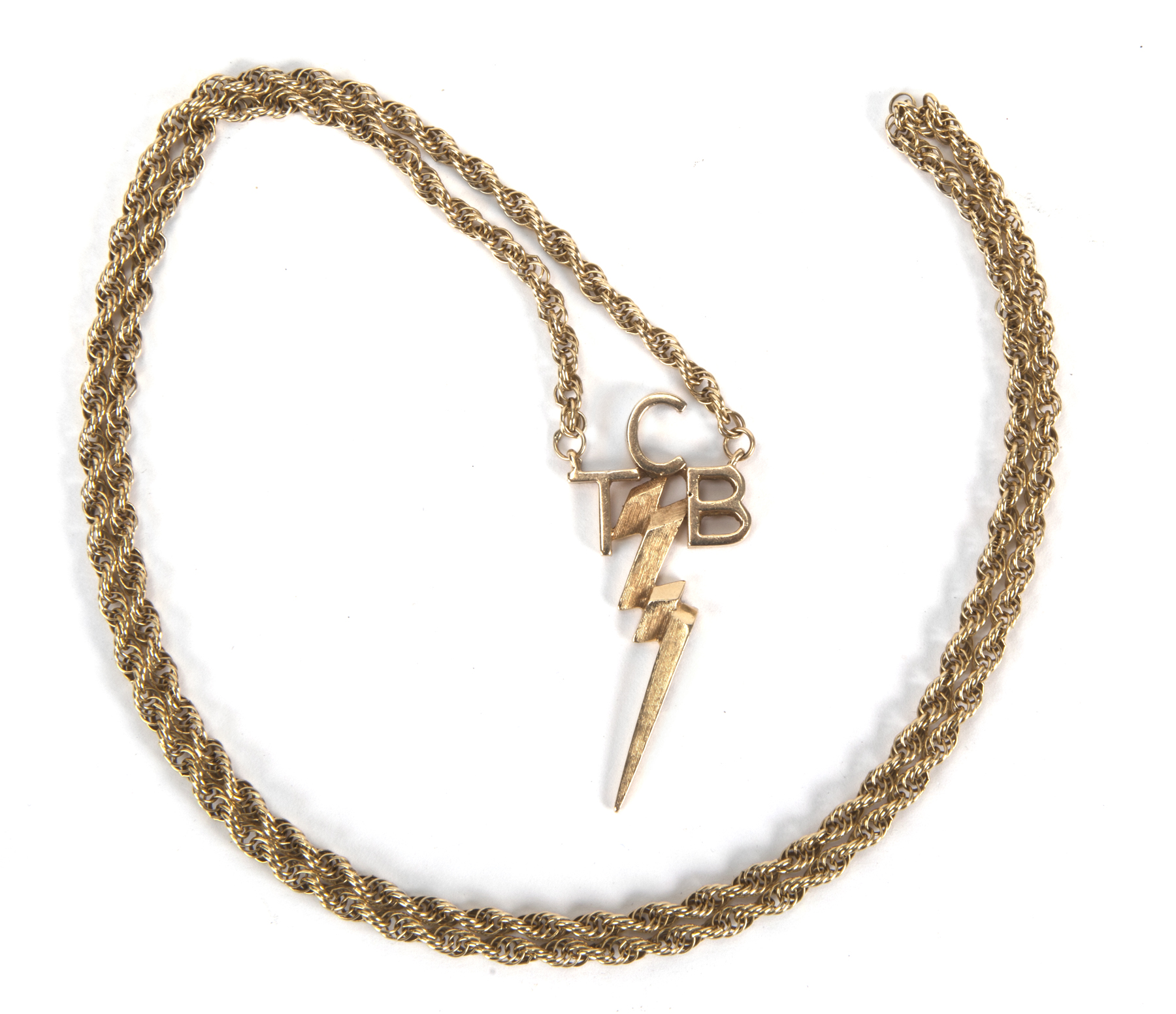 Elvis TCB necklace meaning, why did Elvis Presley wear it, and what does TCB stand for?